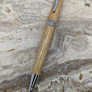 hardwood brown wooden pen that has chrome hardware, nexus style